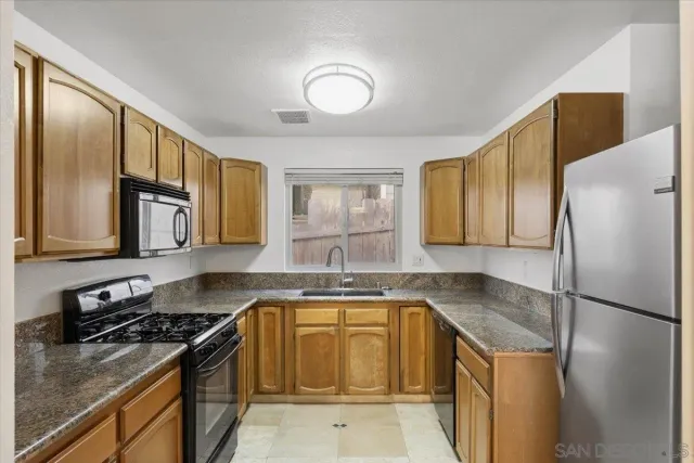 a bathroom with a shower and toilet