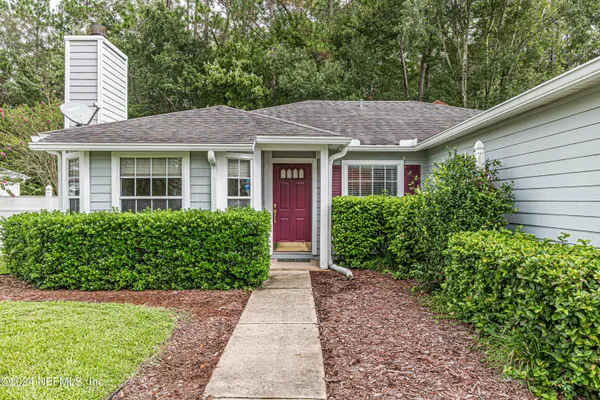 a view of a house with a garden