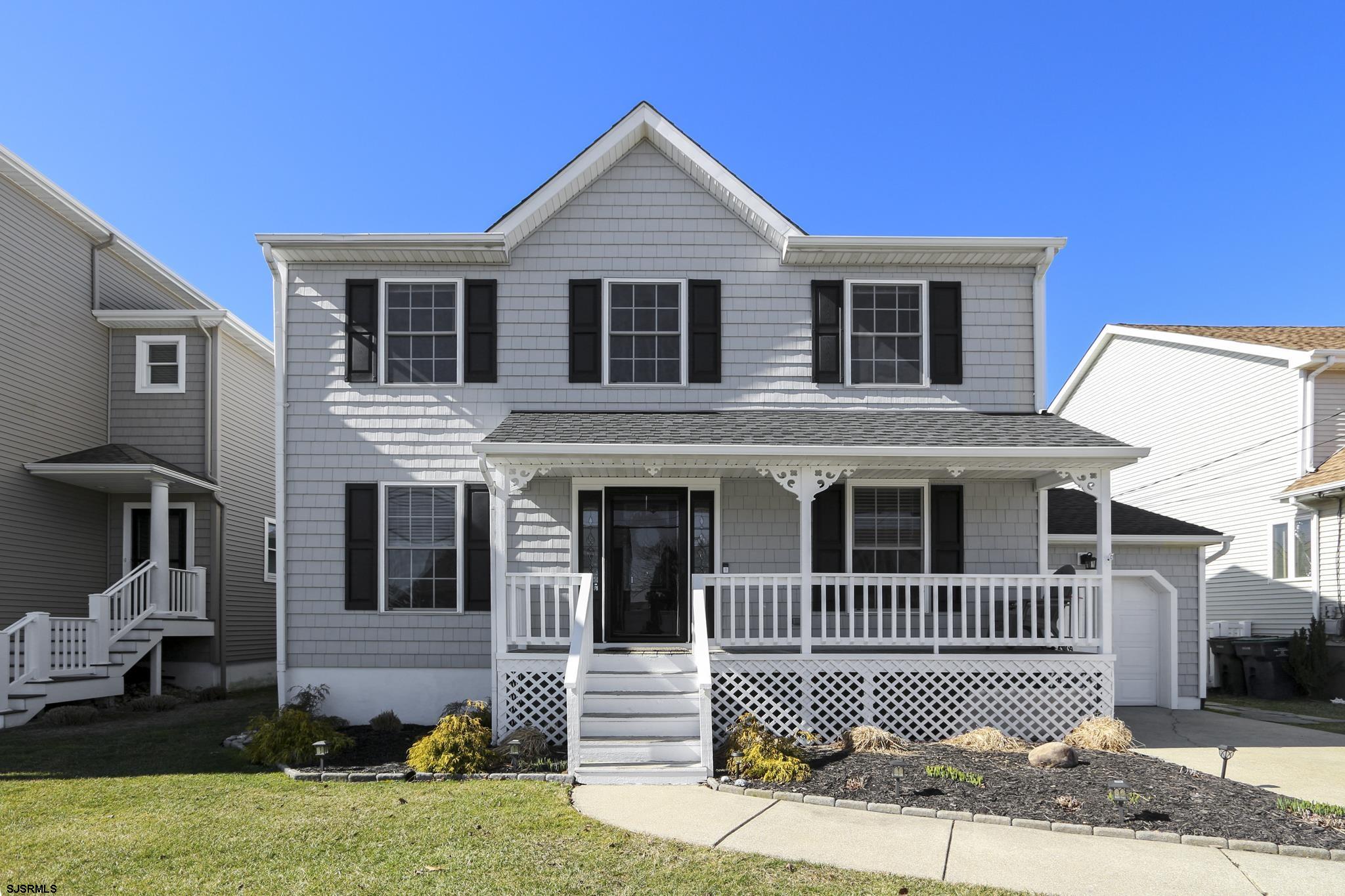 218 Hagen Road Brigantine, NJ 08203 - Photo 1 of 32 a front view of a house with a yard