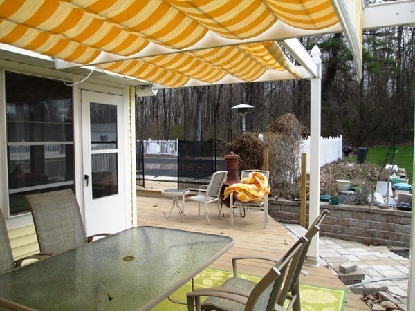 105 George Hill Road Grafton, MA 01519 - Photo 17 of 22 an outdoor view of the house and outdoor seating