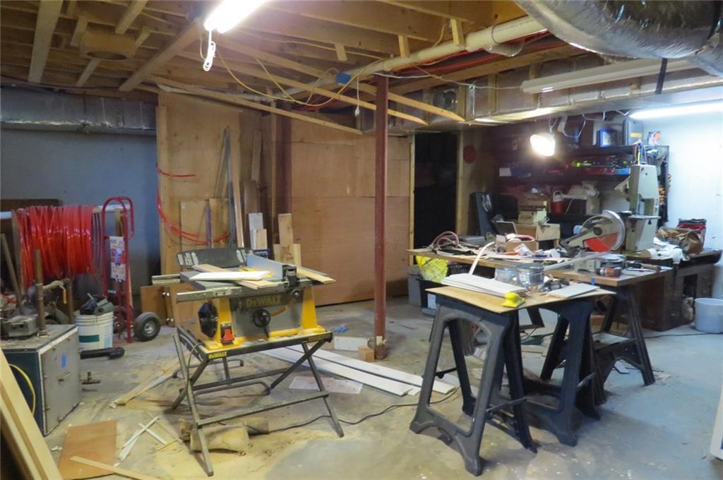 175 Fletcher's Landing Road Ellsworth, ME 04605 - Photo 22 of 32 Work shop in basement