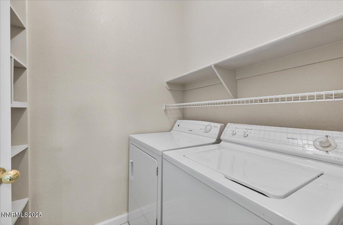 900 South Meadows Parkway, Unit 2322 Reno, NV 89521 - Photo 11 of 40 a utility room with dryer and washer