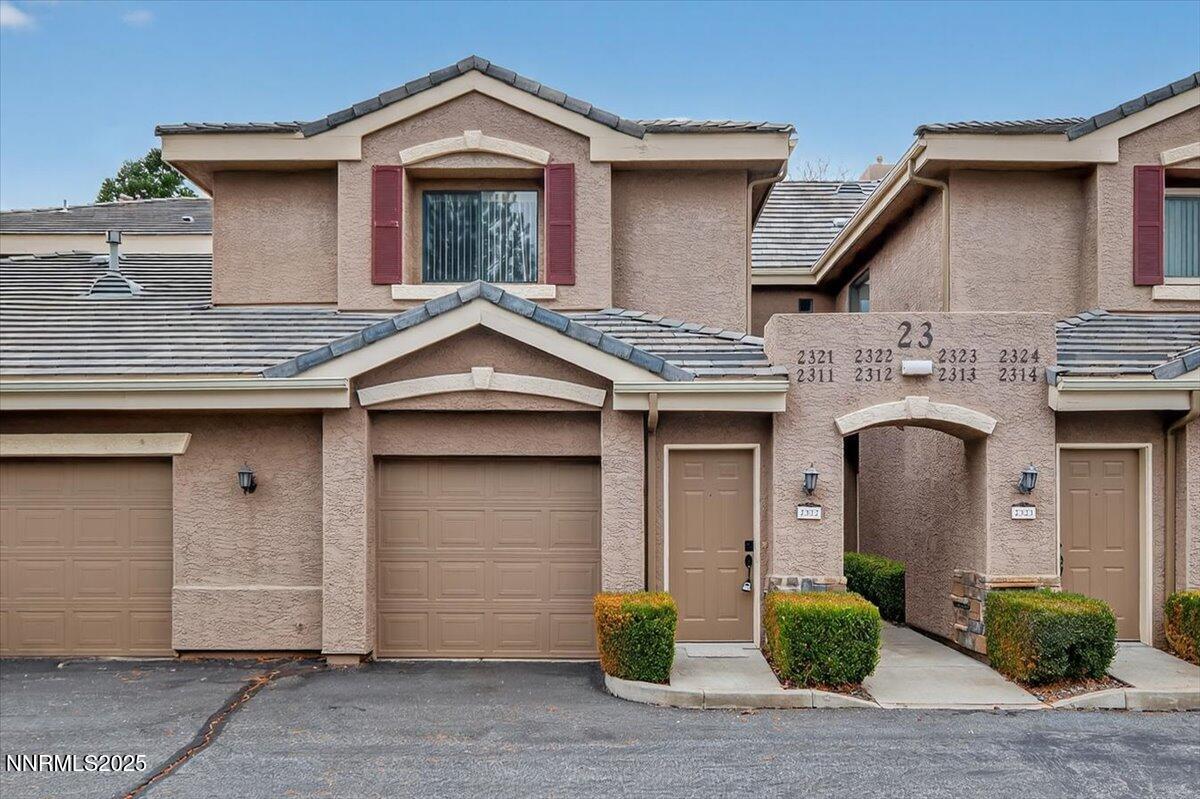 900 South Meadows Parkway, Unit 2322 Reno, NV 89521 - Photo 2 of 40 a front view of a house