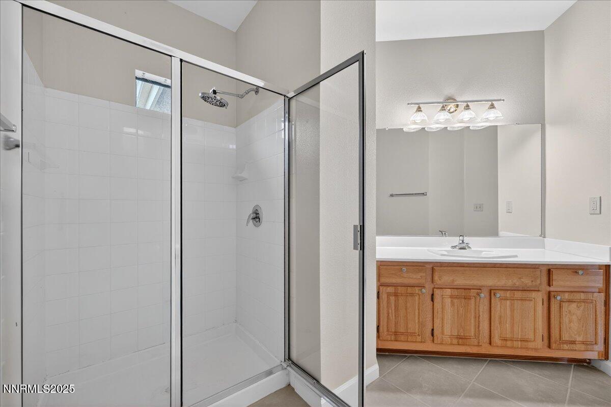 900 South Meadows Parkway, Unit 2322 Reno, NV 89521 - Photo 24 of 40 a bathroom with a shower and a sink