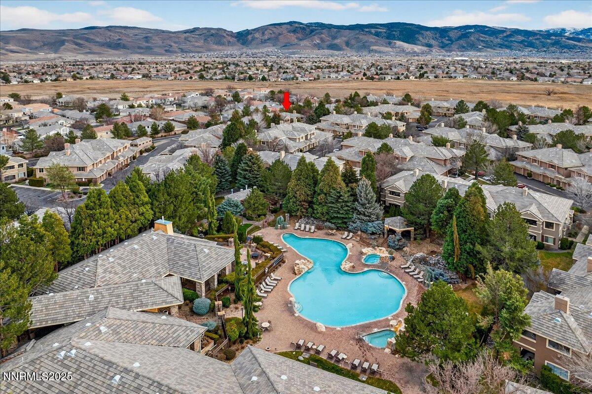 900 South Meadows Parkway, Unit 2322 Reno, NV 89521 - Photo 32 of 40 an aerial view of a house with a yard and lake view