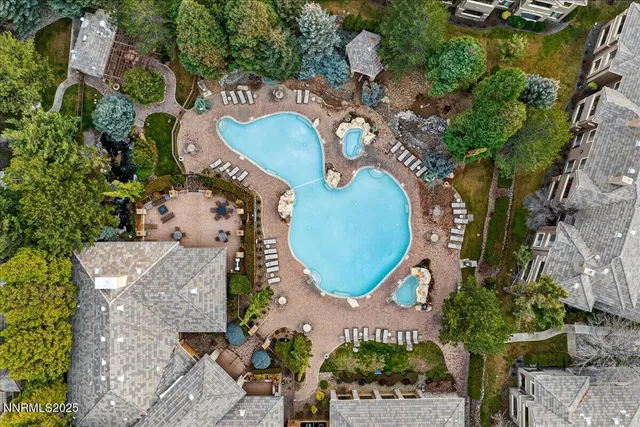 an aerial view of a house having yard