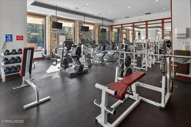a view of a hallway with seating area