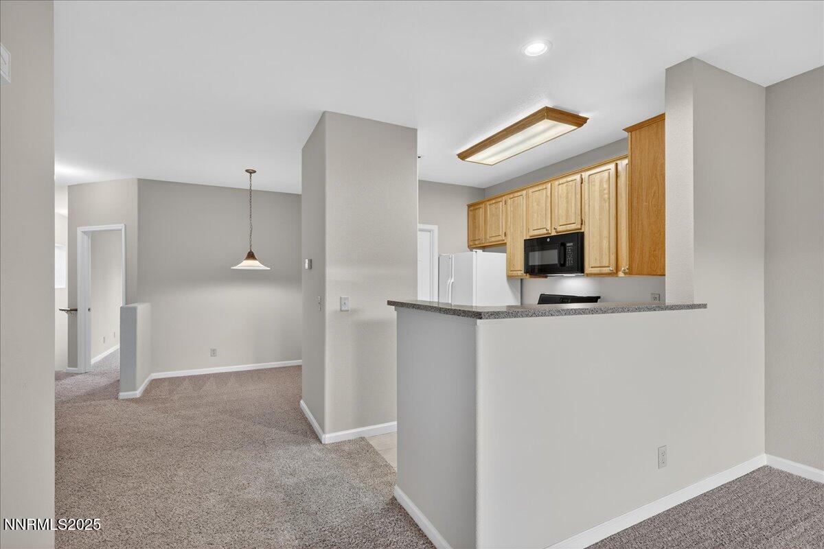900 South Meadows Parkway, Unit 2322 Reno, NV 89521 - Photo 7 of 40 a view of kitchen with wooden floor