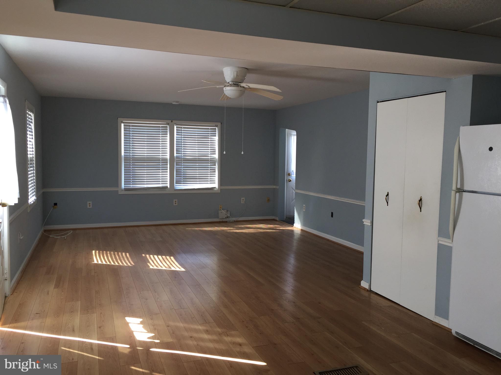 335 Walgrove Road Reisterstown, MD 21136 - Photo 9 of 10 Family room off kitchen with ceiling fan