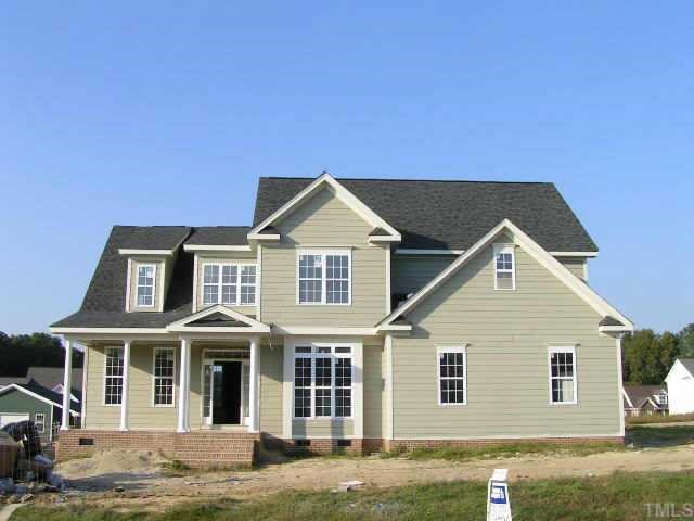 1032 Newburgh Circle Raleigh, NC 27603 - Photo 1 of 1 a front view of a house with a yard