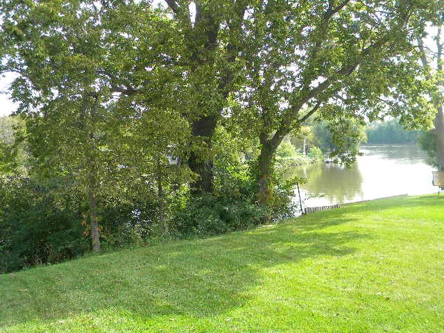 10745 Chicory Ridge Way Roscoe, IL 61073 - Photo 21 of 25 a view of a yard with a tree