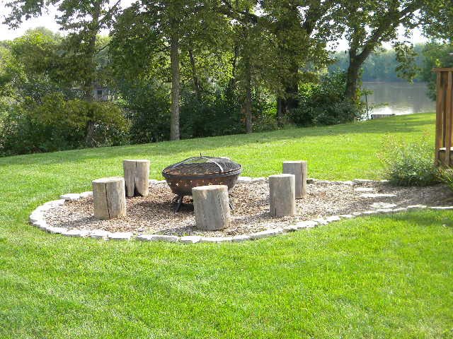 10745 Chicory Ridge Way Roscoe, IL 61073 - Photo 25 of 25 a view of a fountain in a yard with a fountain