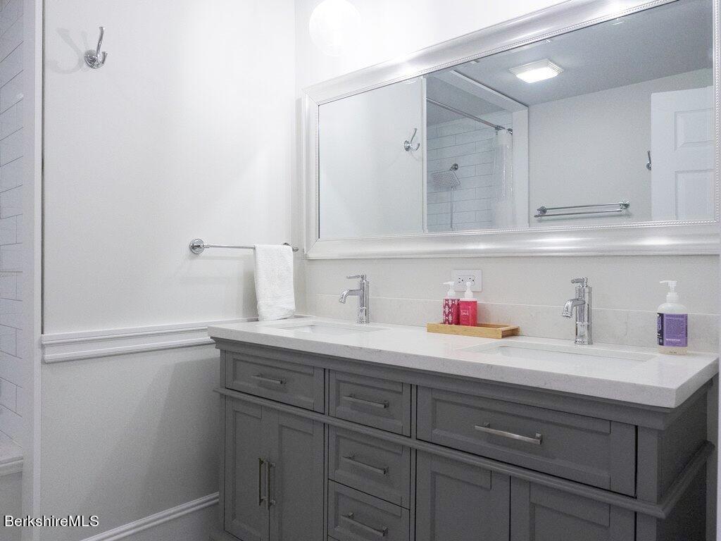 664 Main Road Monterey, MA 01245 - Photo 15 of 19 a bathroom with a sink and a mirror