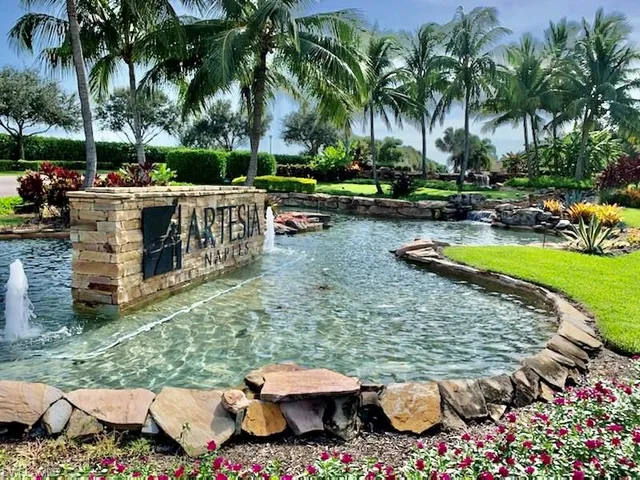 a view of a dining room with furniture a chandelier and wooden floor