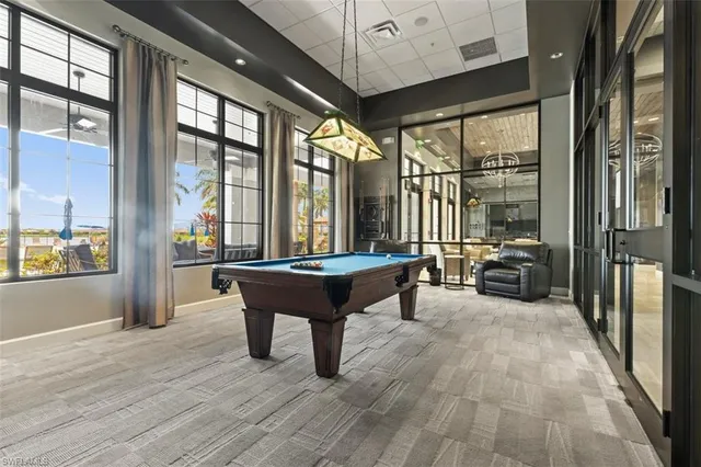 a large room with lots of table and chairs