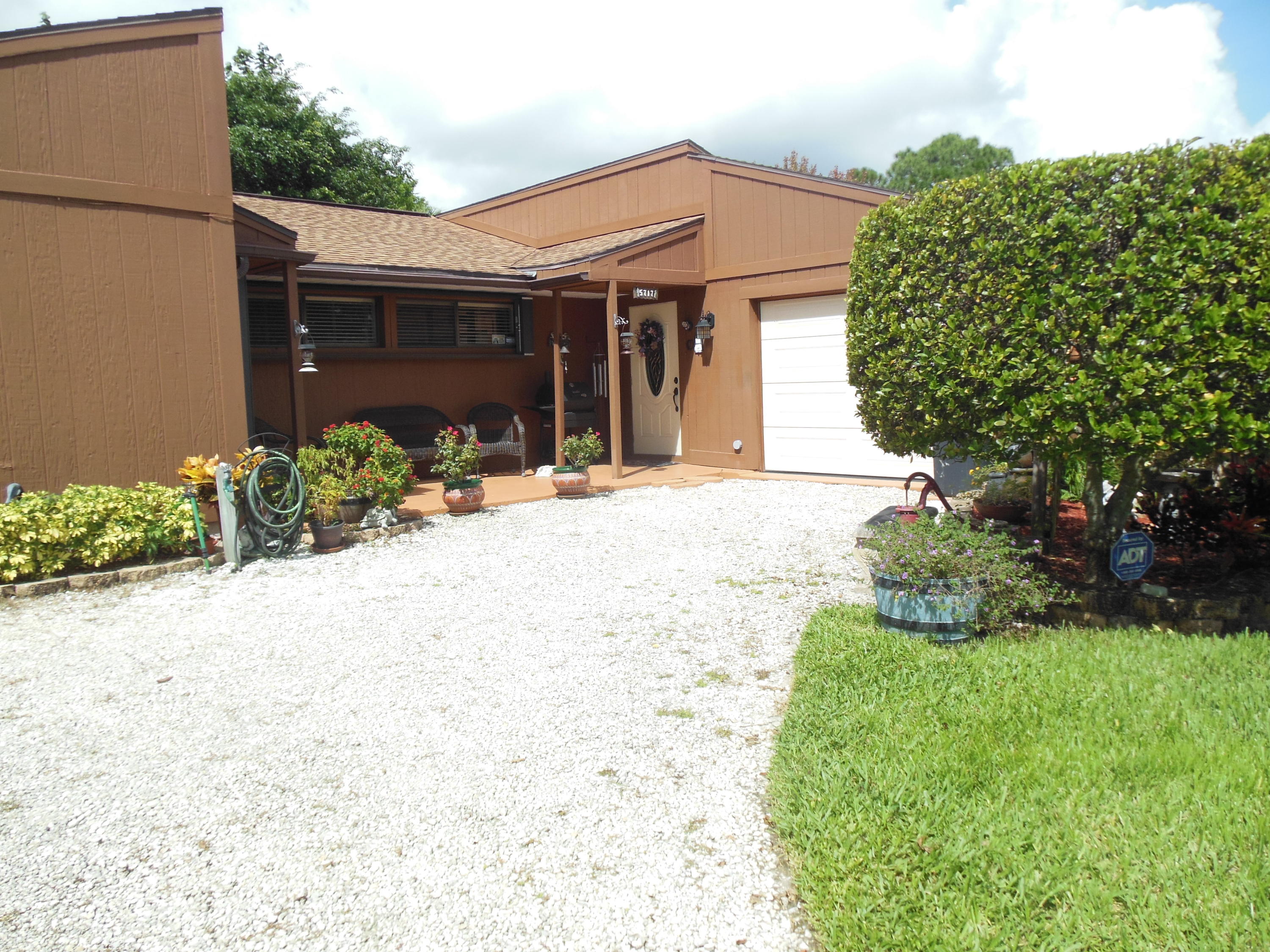 5717 Raintree Trail Fort Pierce, FL 34982 - Photo 1 of 24 Front