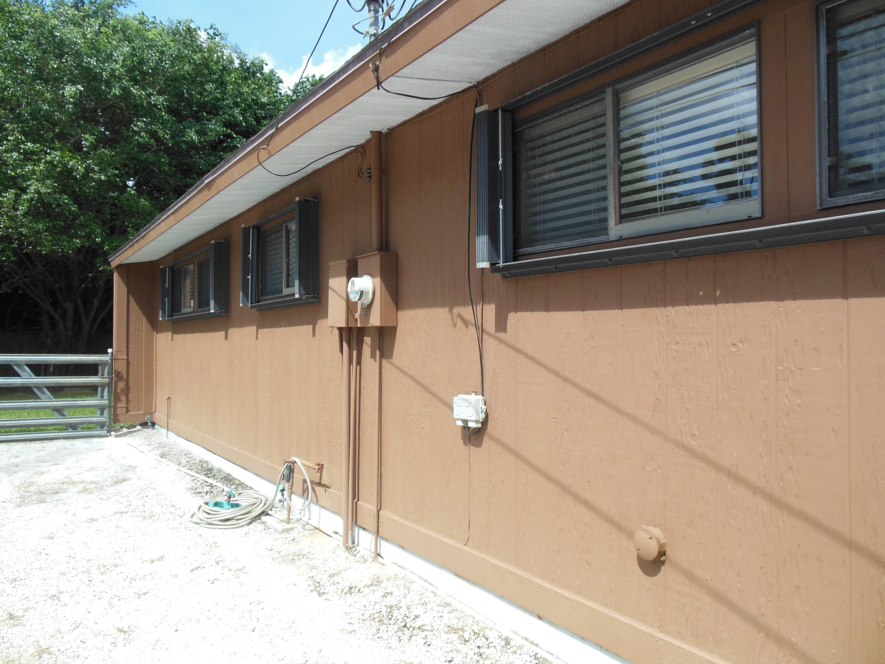 5717 Raintree Trail Fort Pierce, FL 34982 - Photo 6 of 24 South Side of House