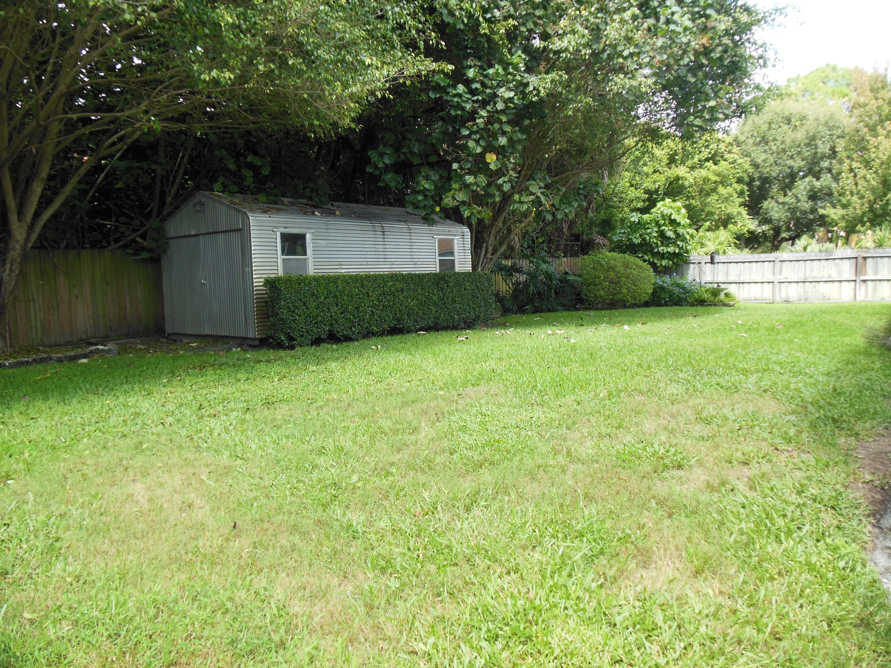 5717 Raintree Trail Fort Pierce, FL 34982 - Photo 8 of 24 Back yard shed