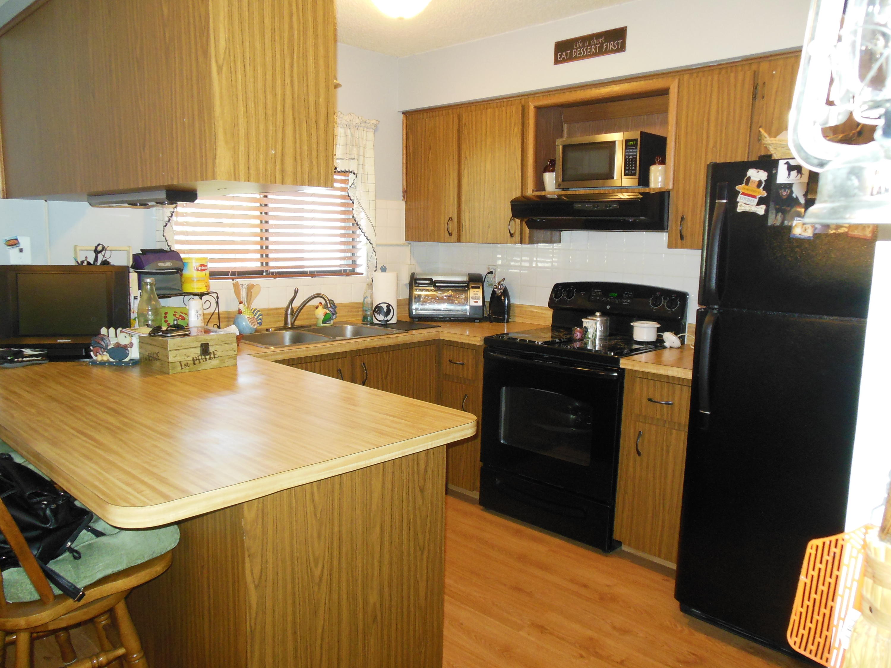 5717 Raintree Trail Fort Pierce, FL 34982 - Photo 9 of 24 Kitchen