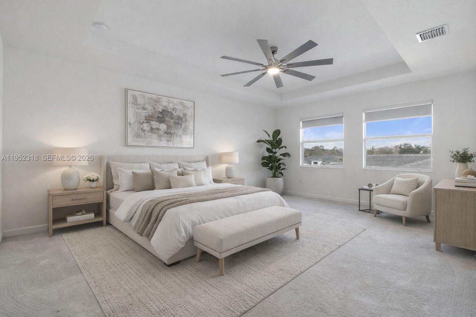 16925 Southwest 289th Terrace Homestead, FL 33033 - Photo 30 of 58 a spacious bedroom with a bed and a couch