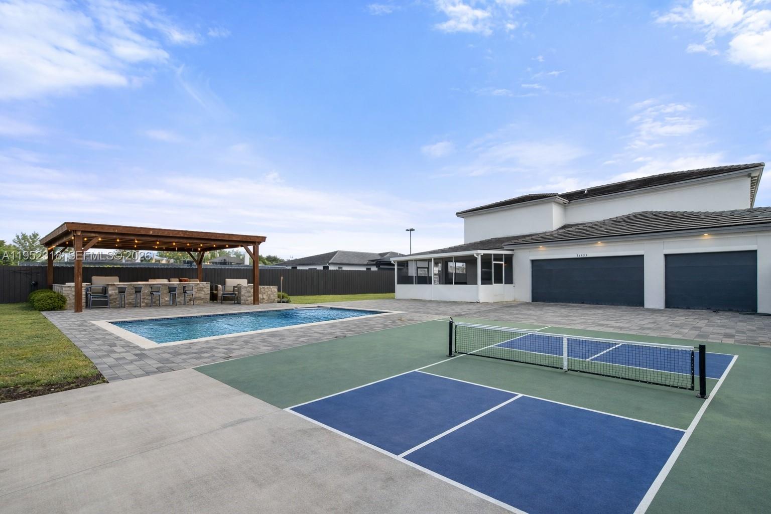 16925 Southwest 289th Terrace Homestead, FL 33033 - Photo 32 of 58 a view of a tennis court