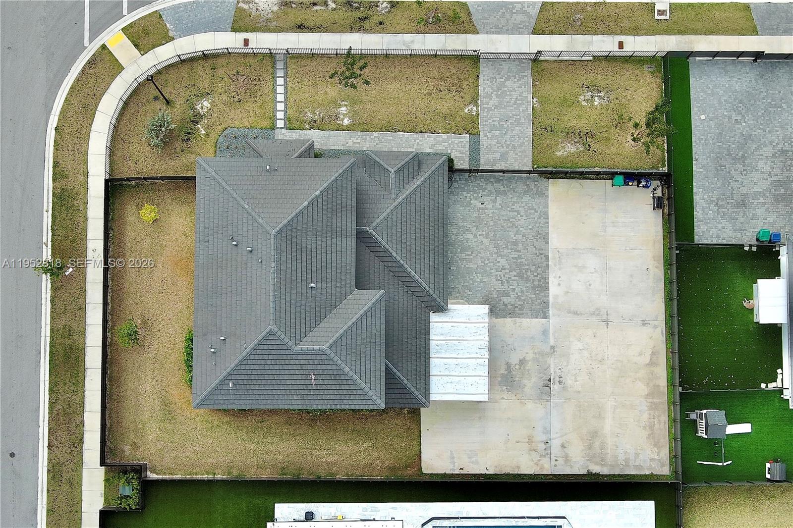 16925 Southwest 289th Terrace Homestead, FL 33033 - Photo 38 of 58 an aerial view of a house with pool