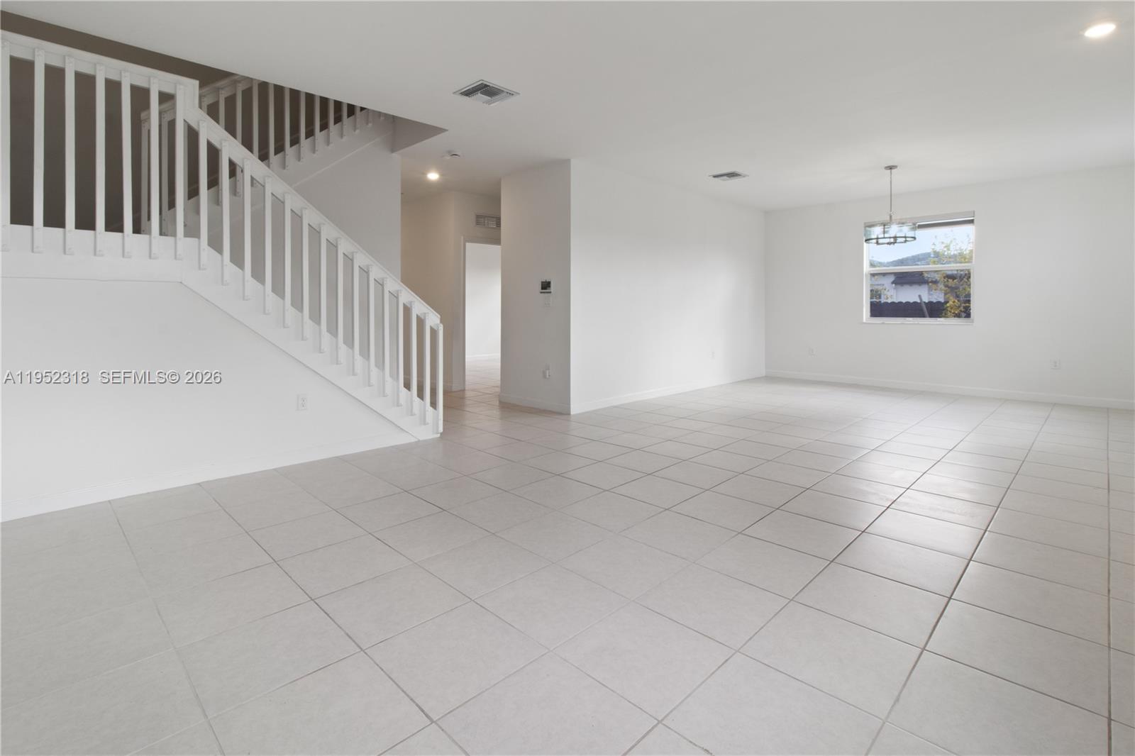 16925 Southwest 289th Terrace Homestead, FL 33033 - Photo 4 of 58 a view of a hallway with entryway