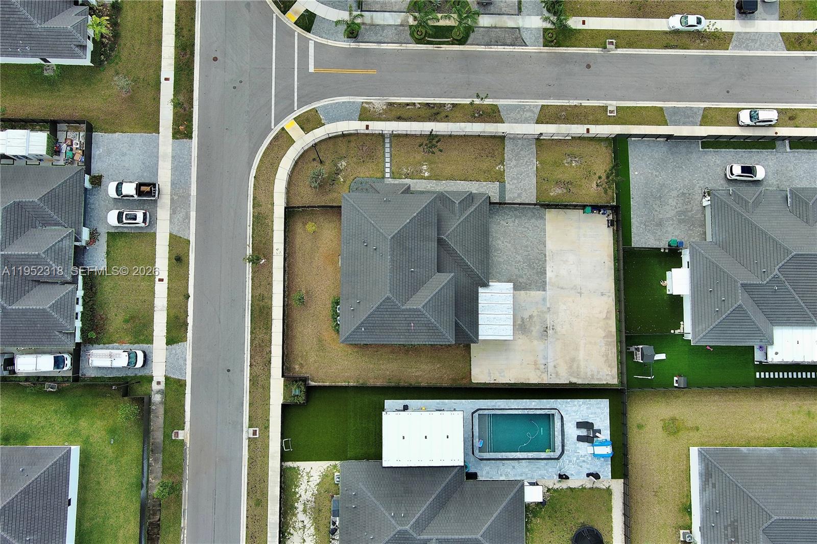 16925 Southwest 289th Terrace Homestead, FL 33033 - Photo 42 of 58 an aerial view of a residential houses with outdoor space and parking