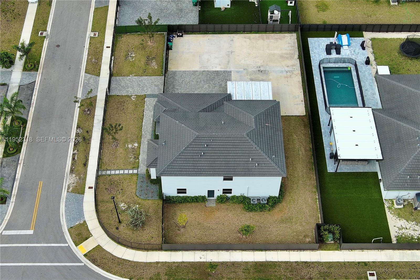 16925 Southwest 289th Terrace Homestead, FL 33033 - Photo 48 of 58 an aerial view of a house with swimming pool