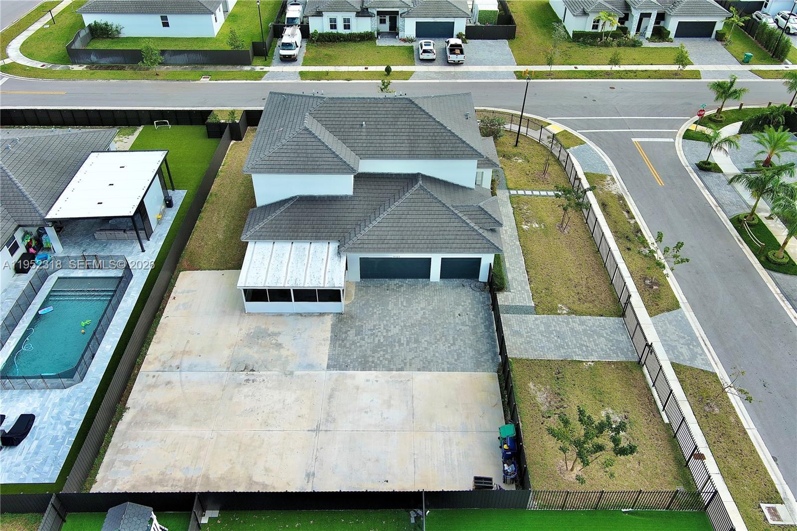 16925 Southwest 289th Terrace Homestead, FL 33033 - Photo 57 of 58 an aerial view of a swimming pool
