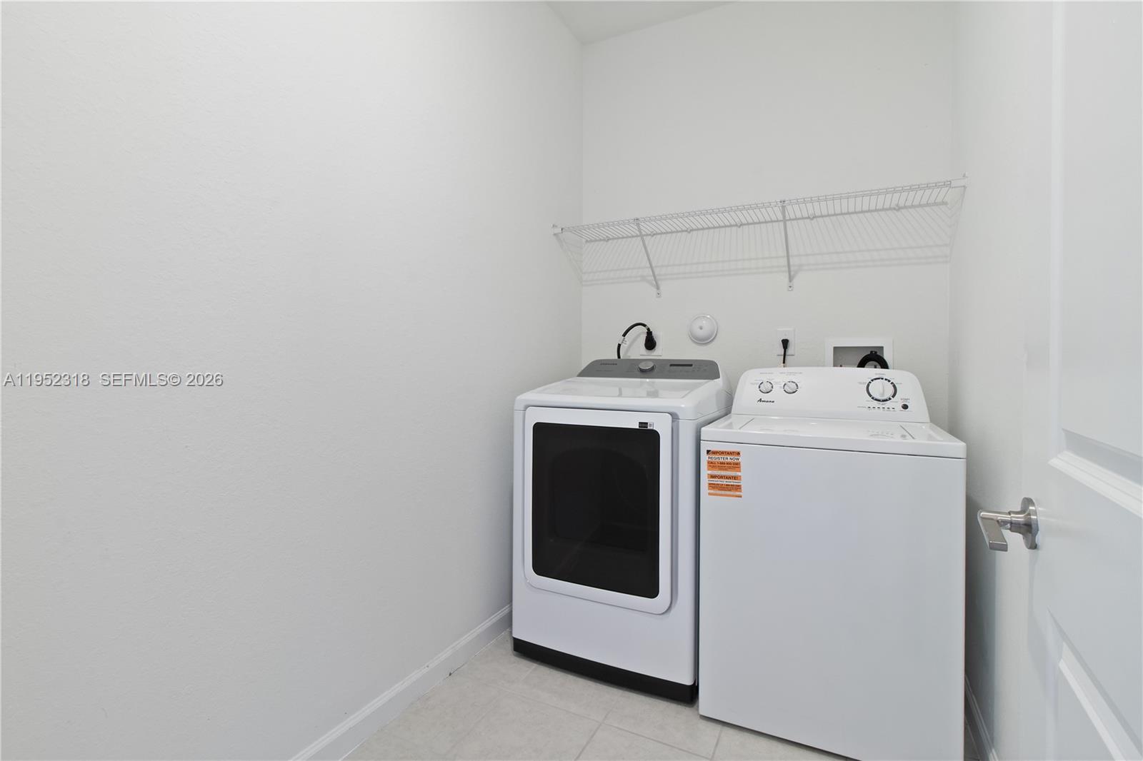 16925 Southwest 289th Terrace Homestead, FL 33033 - Photo 8 of 58 a utility room with dryer and washer