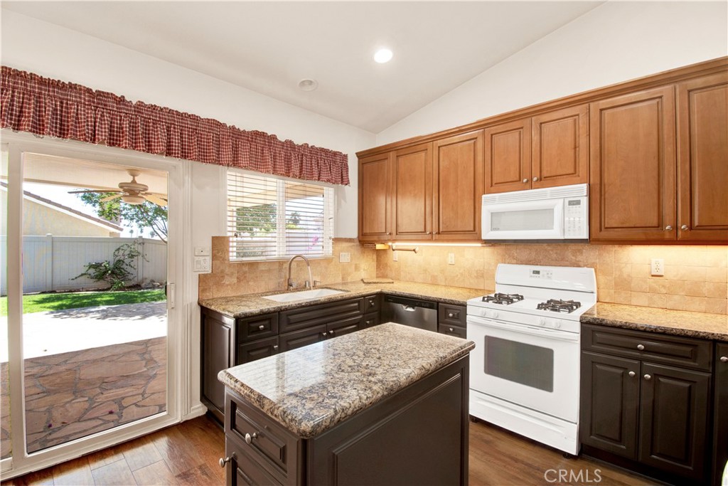 768 Moonlight Court Banning, CA 92220 - Photo 23 of 70 Nice Kitchen Island for extra counter space.