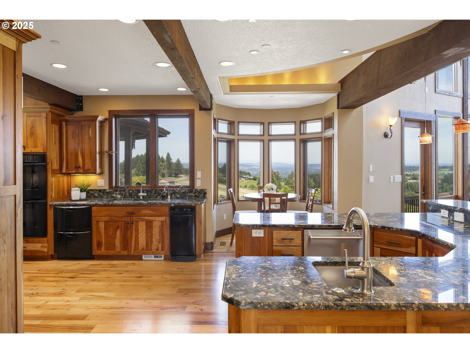 21250 Southwest Jaquith Road Newberg, OR 97132 - Photo 15 of 48 a living room with kitchen island granite countertop furniture and a large window