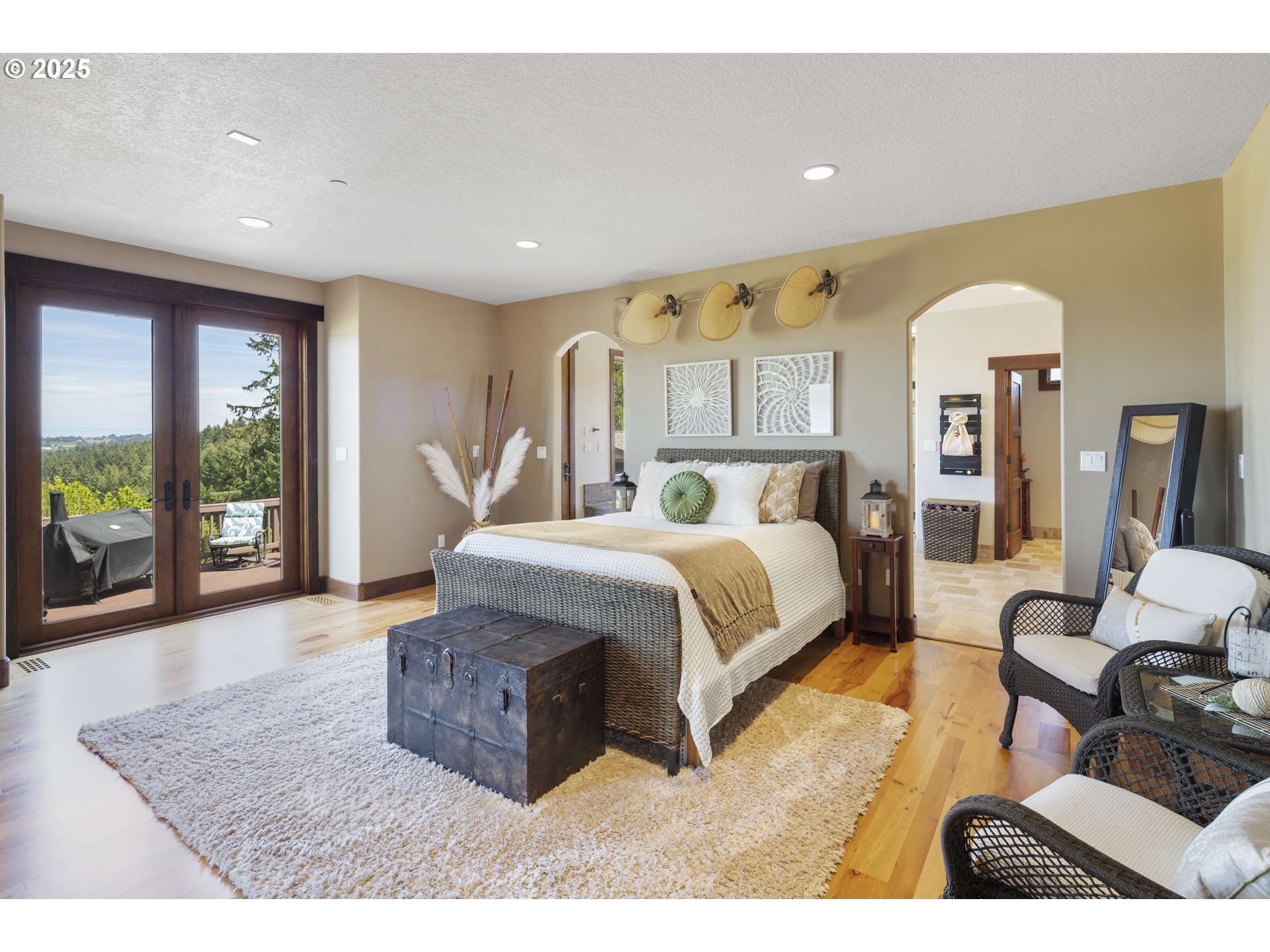 21250 Southwest Jaquith Road Newberg, OR 97132 - Photo 19 of 48 a spacious bedroom with a large bed and windows