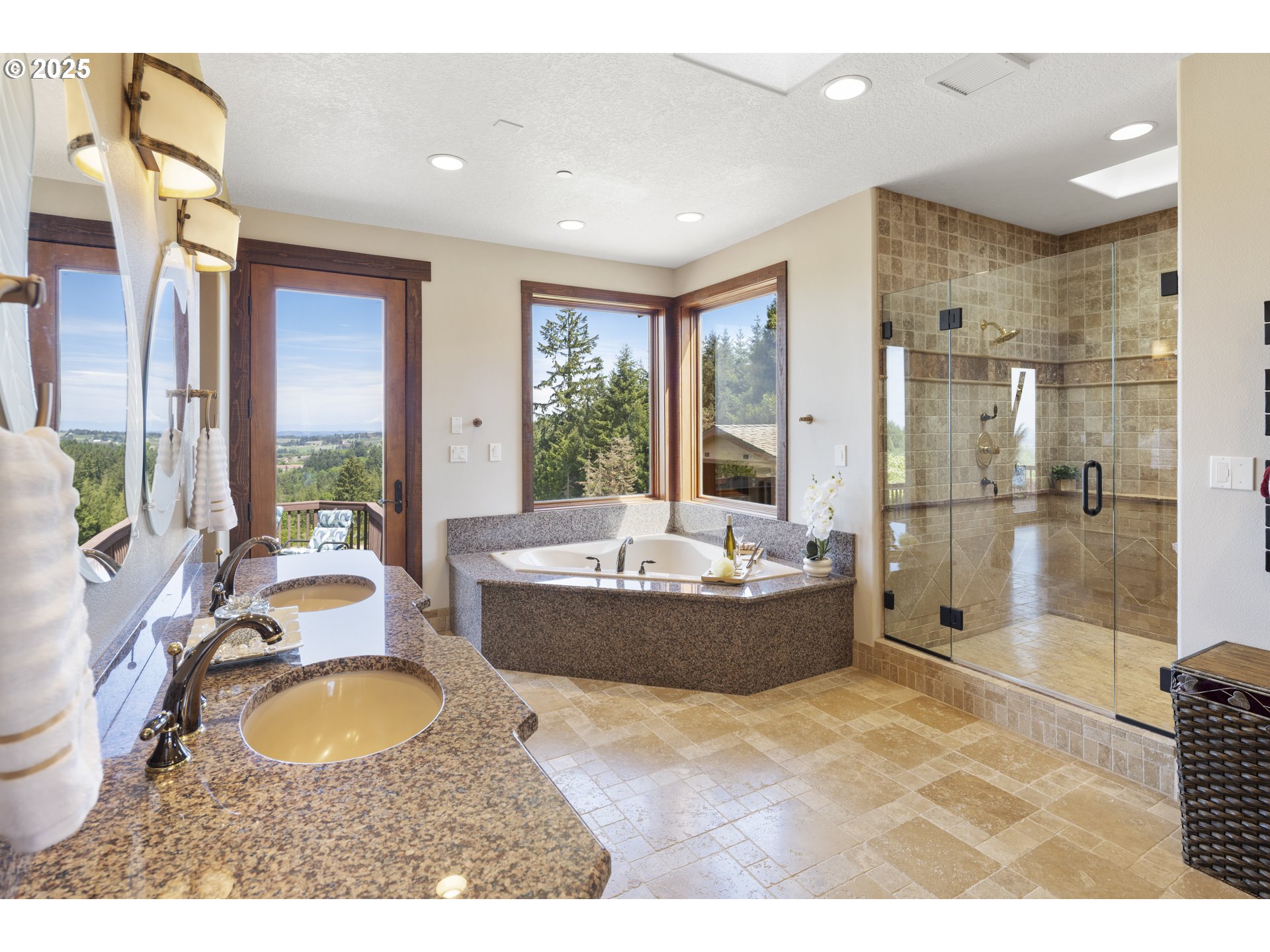 21250 Southwest Jaquith Road Newberg, OR 97132 - Photo 21 of 48 a large bathroom with a tub a sink and a large mirror
