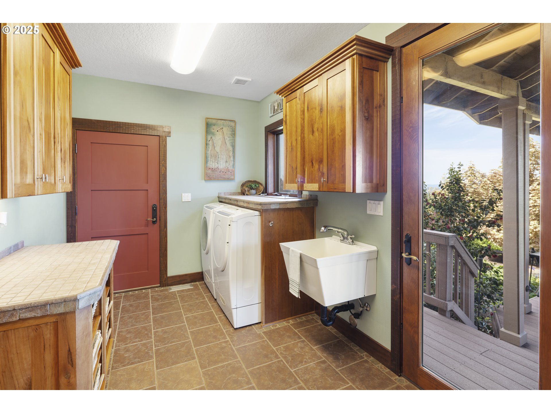 21250 Southwest Jaquith Road Newberg, OR 97132 - Photo 24 of 48 a living room with a couch and a table