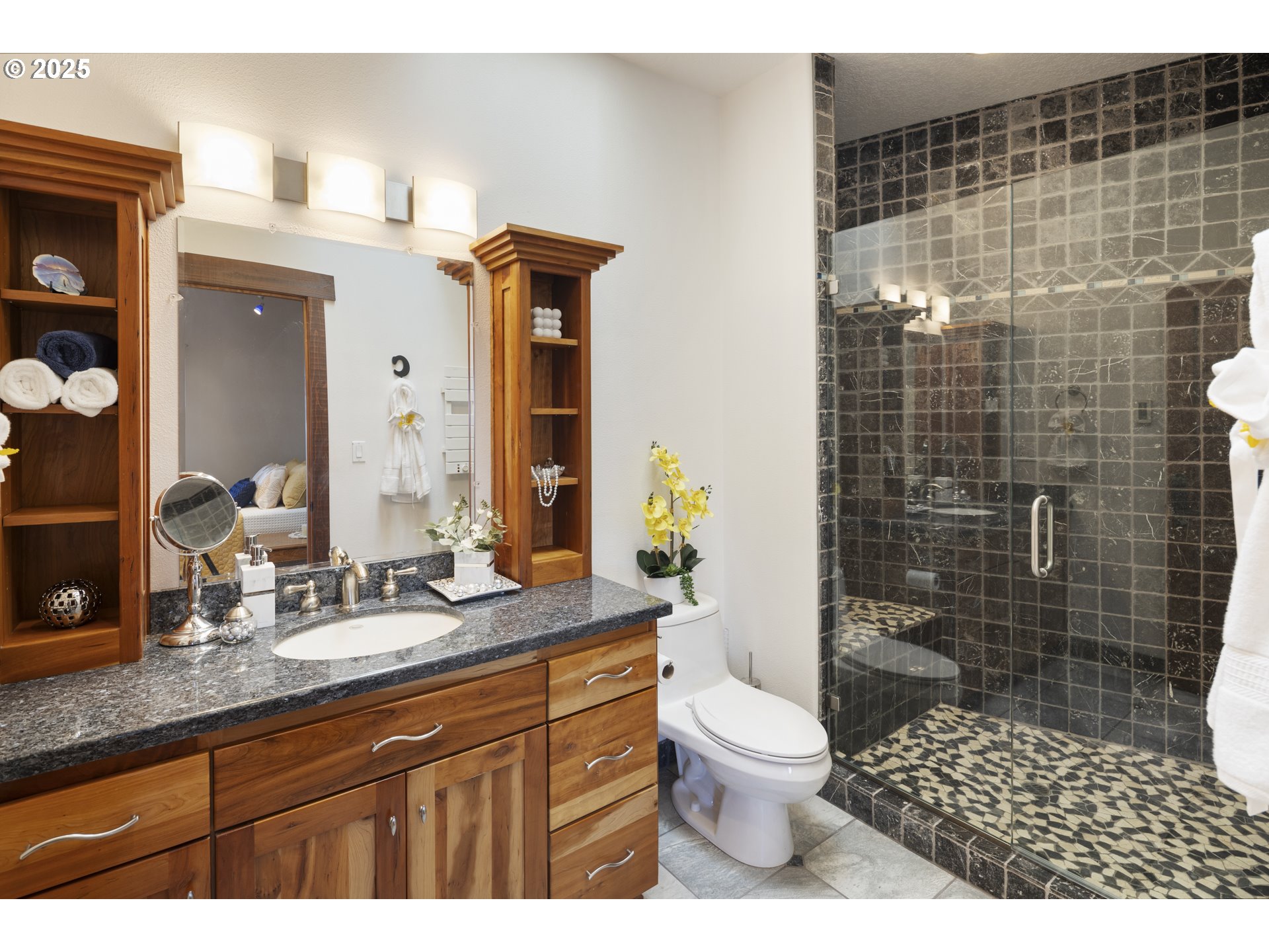 21250 Southwest Jaquith Road Newberg, OR 97132 - Photo 32 of 48 a bathroom with a granite countertop toilet a sink and a mirror
