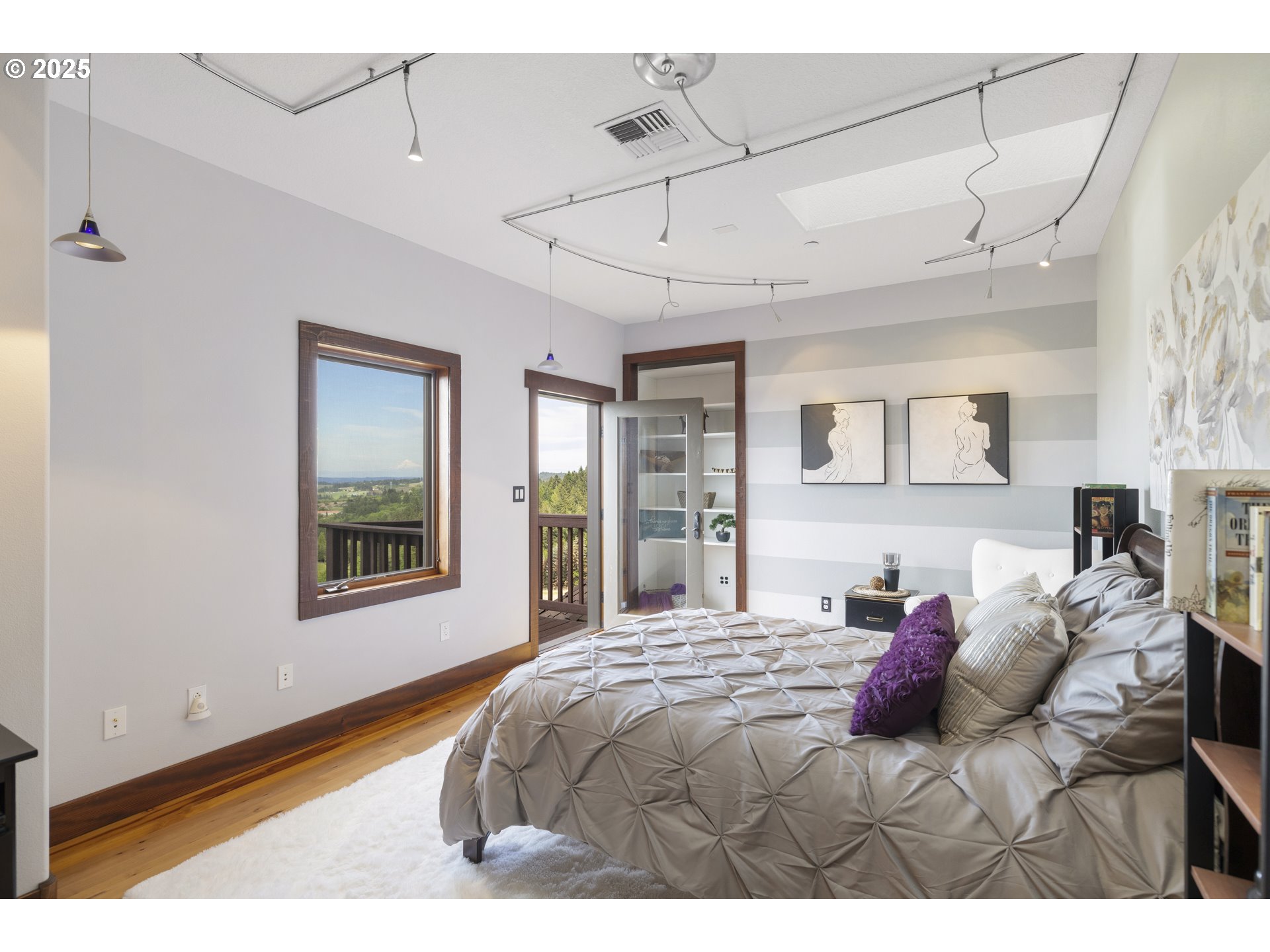 21250 Southwest Jaquith Road Newberg, OR 97132 - Photo 33 of 48 a bedroom with a bed wooden floor and window