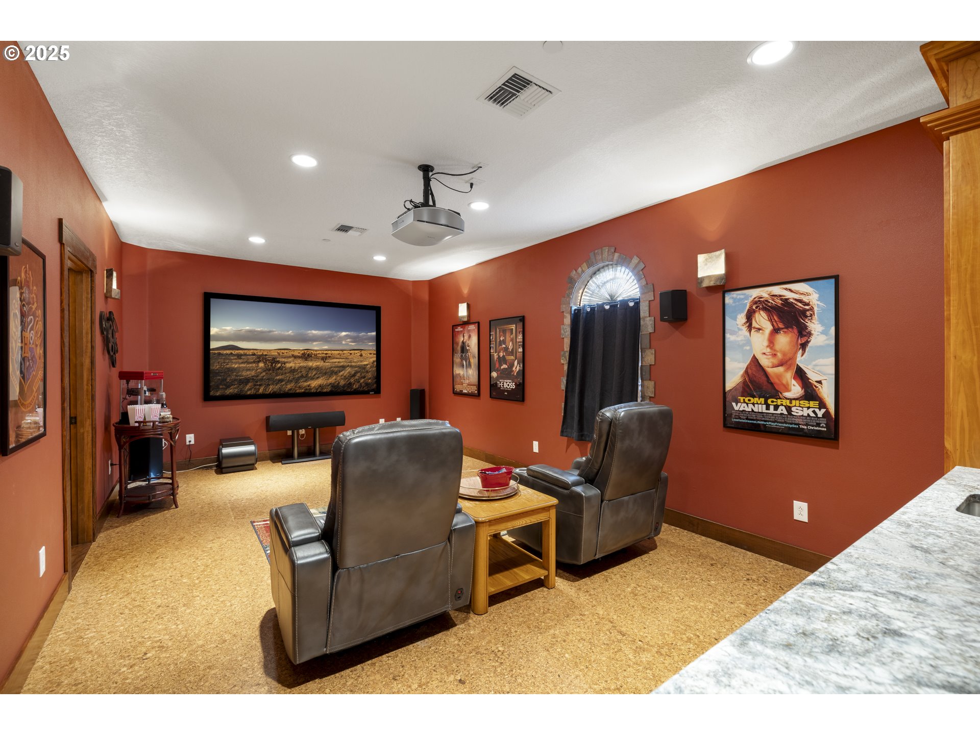 21250 Southwest Jaquith Road Newberg, OR 97132 - Photo 36 of 48 a living room with furniture and a flat screen tv