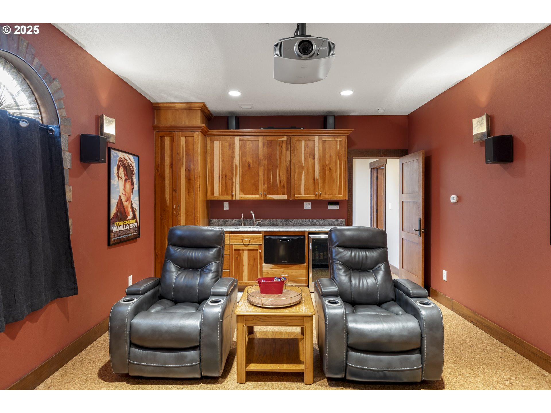 21250 Southwest Jaquith Road Newberg, OR 97132 - Photo 37 of 48 a living room with furniture and a flat screen tv