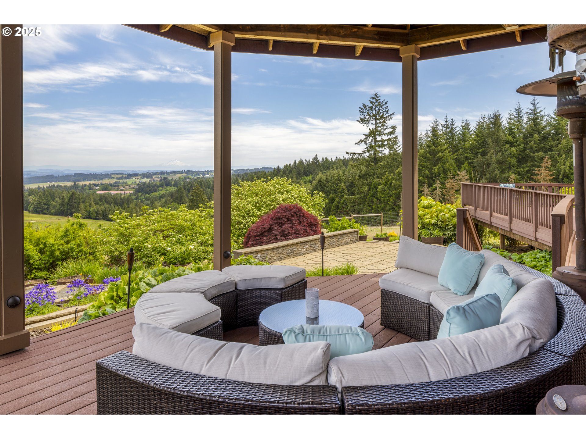 21250 Southwest Jaquith Road Newberg, OR 97132 - Photo 42 of 48 a view of a patio with couches chairs dining table and chairs