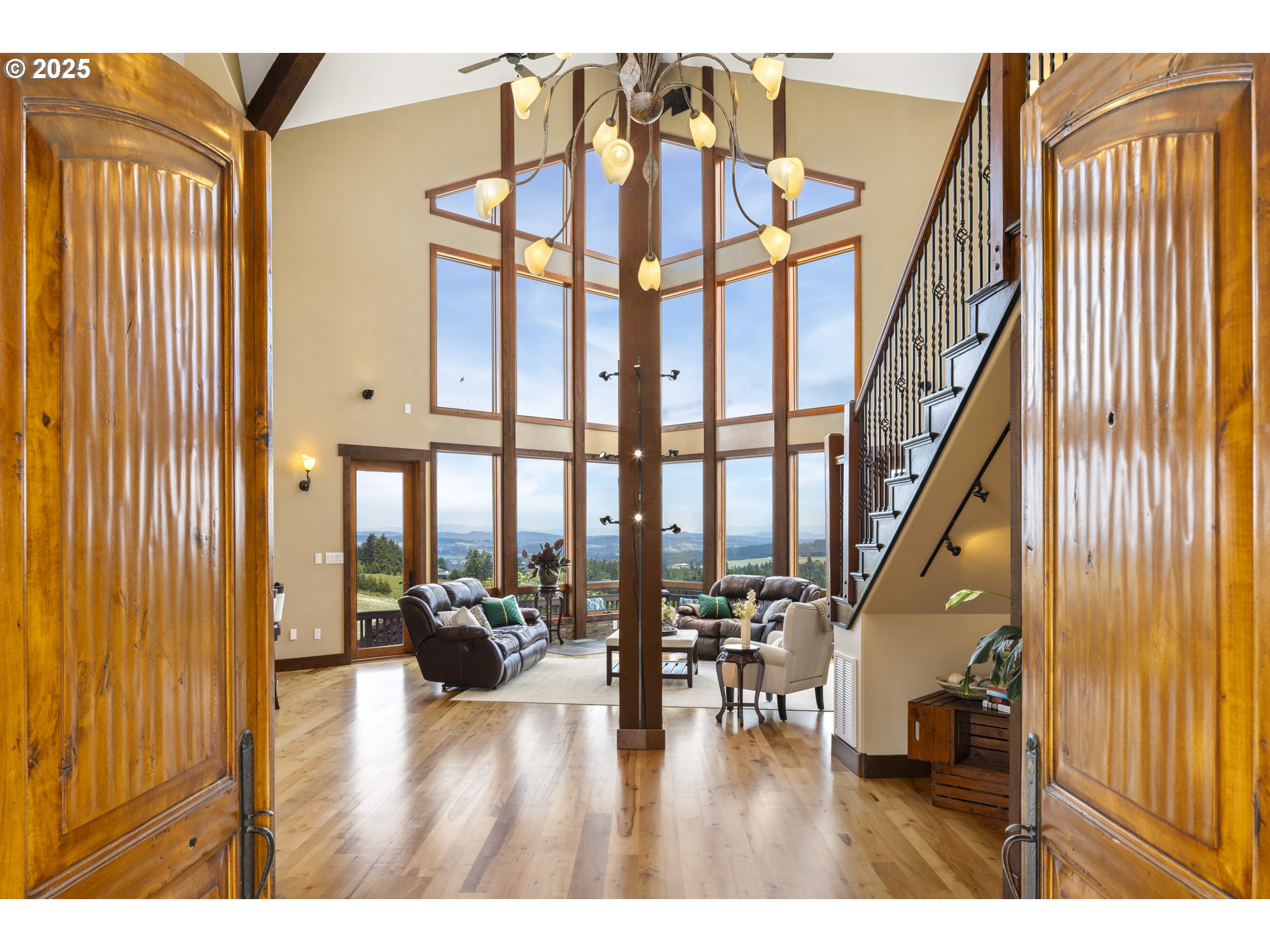 21250 Southwest Jaquith Road Newberg, OR 97132 - Photo 7 of 48 a hallway with a large window and wooden floor