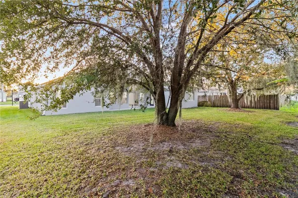 a view of a house with a big yard