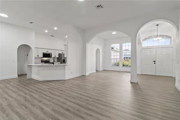a view of an empty room and window
