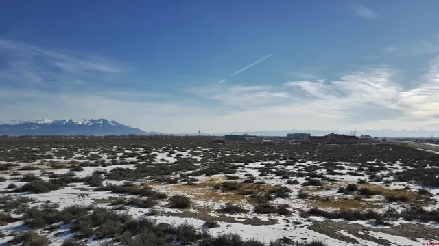 an aerial view of residential house with parking space