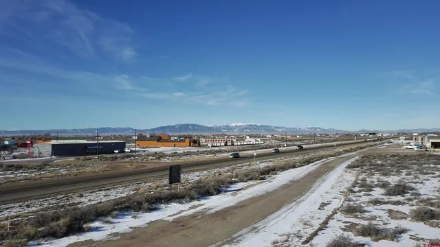a sign broad on the side of a street