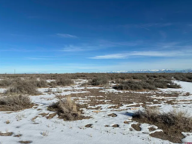 a view of a lake with a mountain
