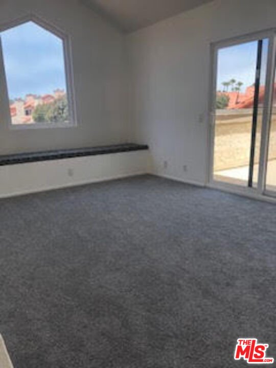 4510 Antigua Way Oxnard, CA 93035 - Photo 4 of 12 a view of an empty room and window