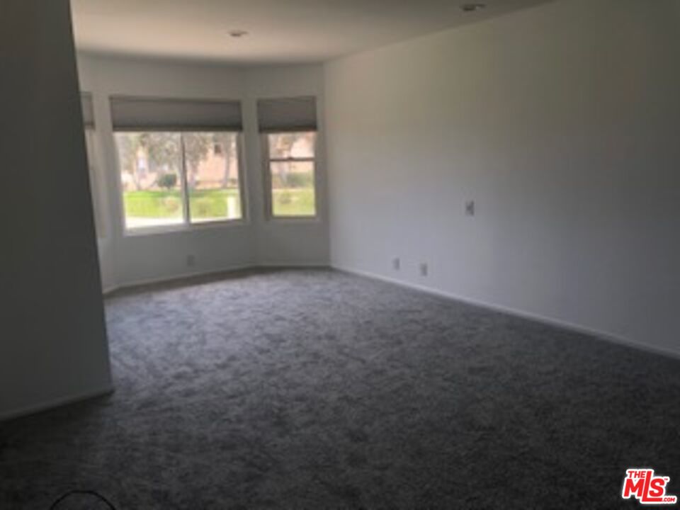 4510 Antigua Way Oxnard, CA 93035 - Photo 7 of 12 an empty room with windows