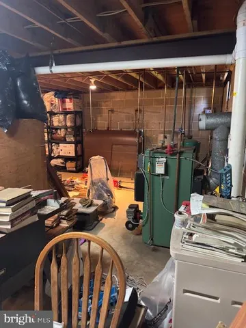 a storage room with washer and dryer